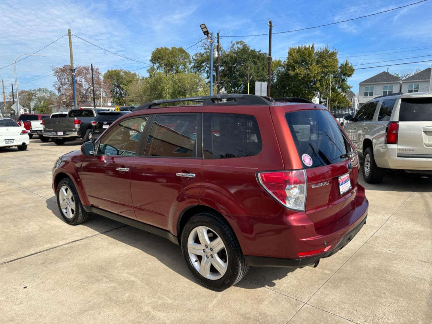 2009 Red /Black Subaru Forester X Limited (JF2SH64619H) with an 2.5 engine, Automatic transmission, located at 1501 West 15th St., Houston, 77008, (713) 869-2925, 29.797941, -95.411789 - Photo#3